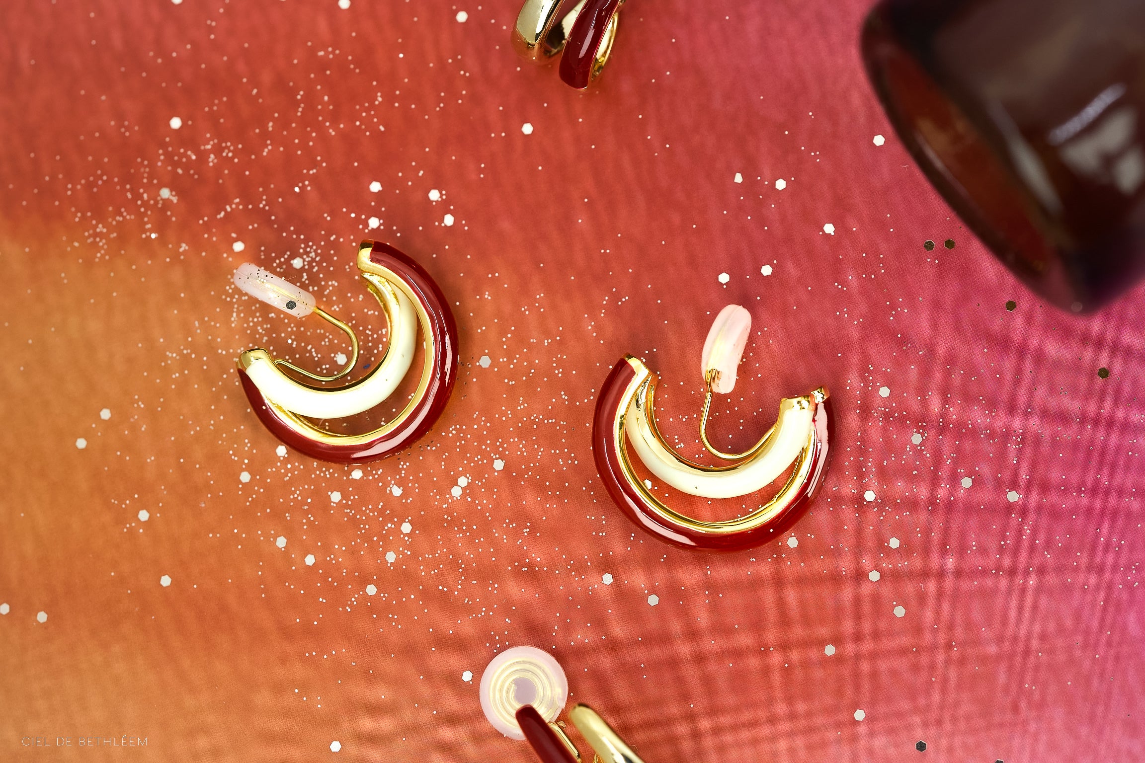 Joyful Ruby Cross Hoops